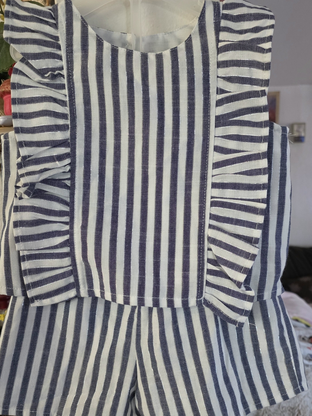 Two-piece suit with shiny stripes